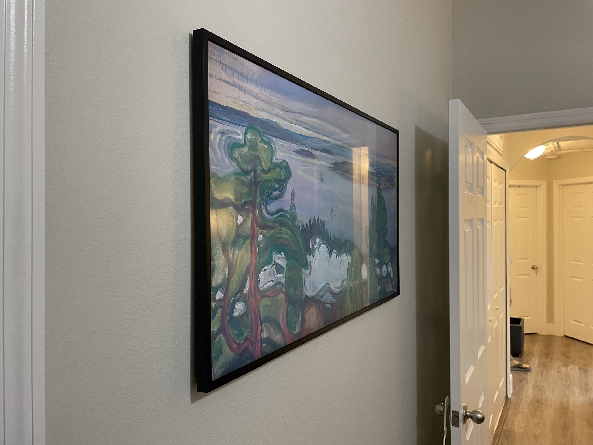 Samsung Frame TV mounted flush to the wall with concealed wiring